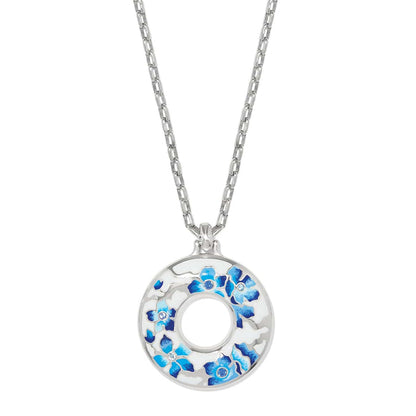 Brighton pendant necklace with silver-plated open circle, blue and white enamel flowers, and crystal accents on a white background