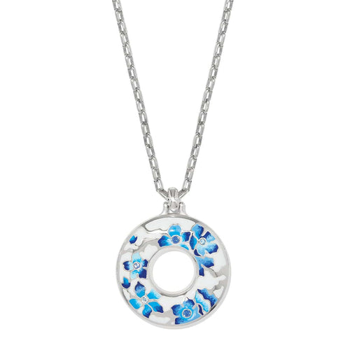 Brighton pendant necklace with silver-plated open circle, blue and white enamel flowers, and crystal accents on a white background