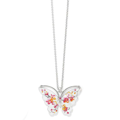 Brighton pendant necklace with silver-plated butterfly featuring pink and orange enamel floral design and crystal accent on a white background