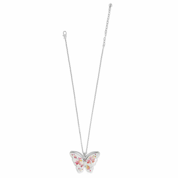 Brighton pendant necklace with silver-plated butterfly featuring pink floral enamel and crystal accent on a white background