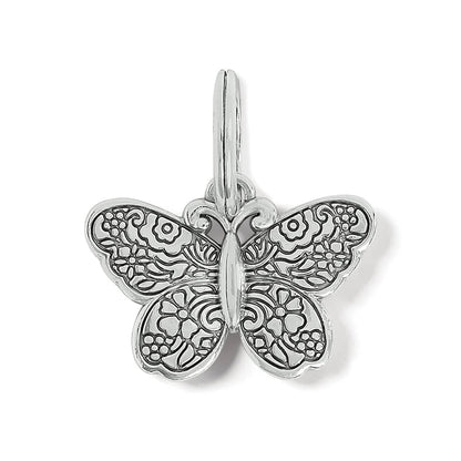 Brighton butterfly charm with silver-plated finish and detailed floral engraved wings on a white background
