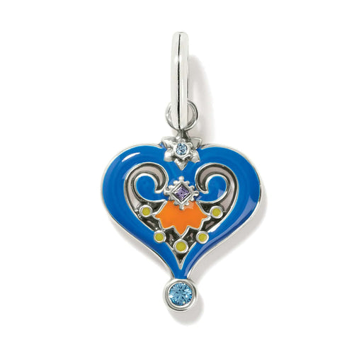 Brighton heart charm with blue and orange enamel, crystal accents, and silver-plated scrollwork on a white background