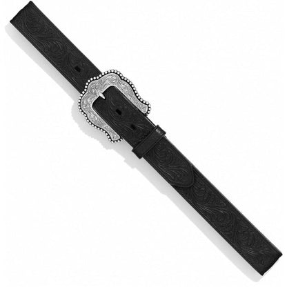 Brighton black tooled leather belt with ornate silver-tone scrolled buckle and floral embossed strap on a white background