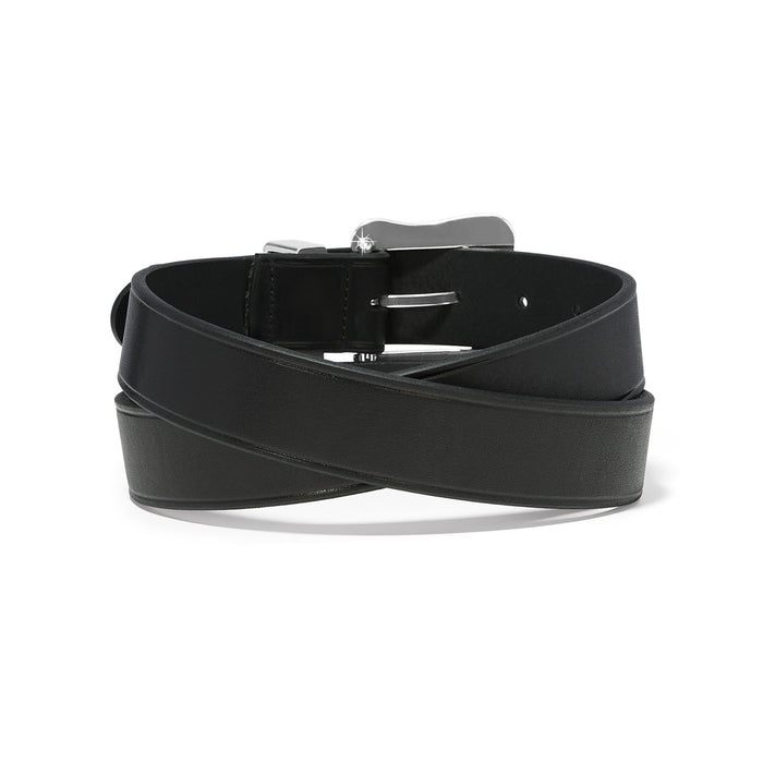 Brighton black leather belt coiled with silver-tone buckle and single-prong closure on a white background