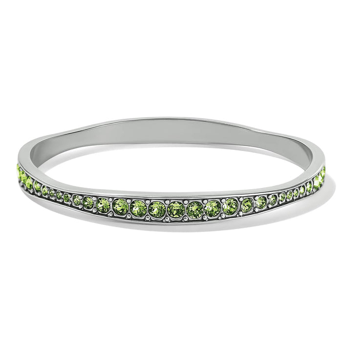 Brighton bangle bracelet with green crystal row and silver-plated finish on a white background