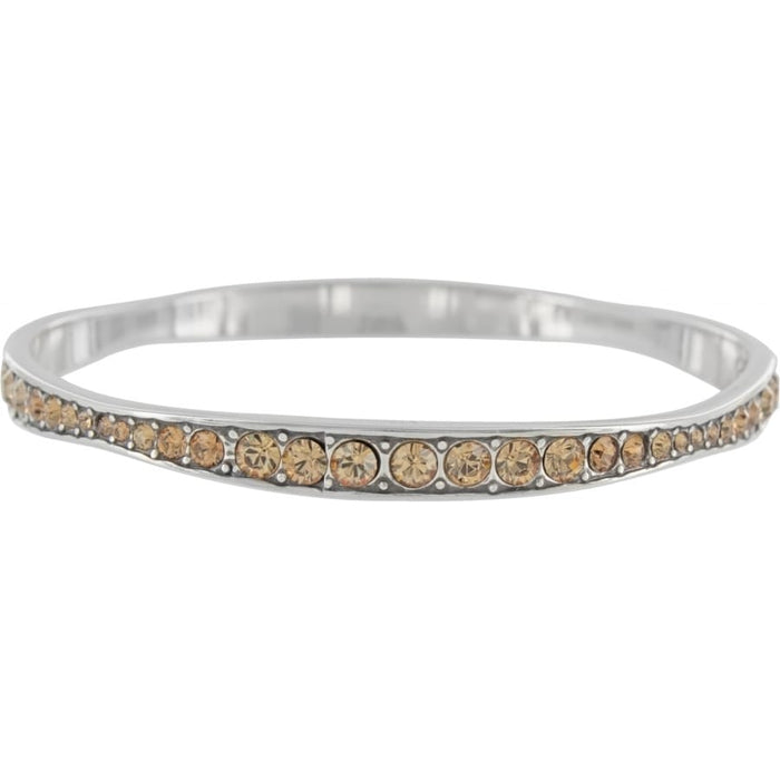 Brighton silver-plated bangle bracelet with row of orange fine quality crystals and beaded detailing on a white background
