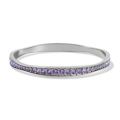Brighton bangle bracelet with silver-plated finish and pavé purple crystal band on a white background