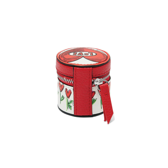 Brighton round leather jewelry case with red trim, illustrated heart and floral print, and zip closure on a white background