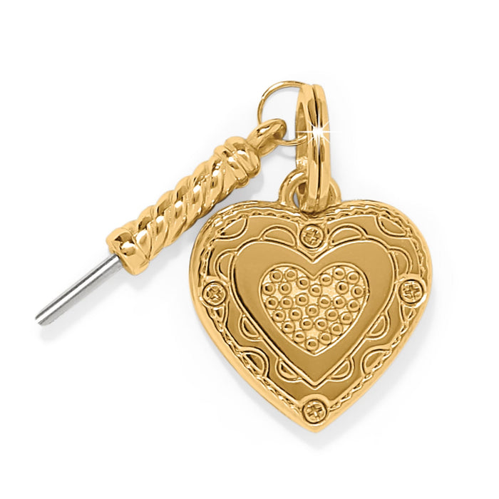 Brighton gold-plated heart charm with decorative scrollwork border and textured center heart motif on a white background