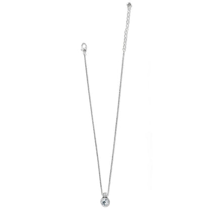 Brighton pendant necklace with round crystal stone, silver-plated pave bail, and lobster clasp on a white background