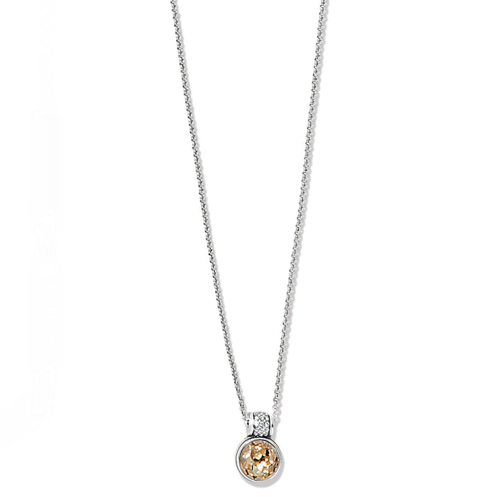 Brighton pendant necklace with round champagne crystal and silver-plated crystal-accented bail on a white background