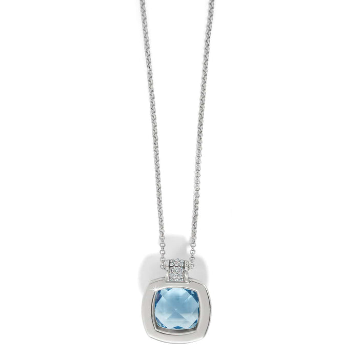 Brighton pendant necklace with light blue faceted crystal and silver-plated frame with crystal accents on a white background