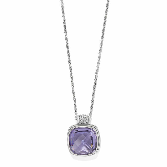 Brighton pendant necklace with faceted purple crystal and silver-plated chain with crystal accent bail on a white background