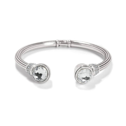 Brighton silver-plated cuff bracelet with two large faceted crystal end caps and pavé crystal accents on a white background