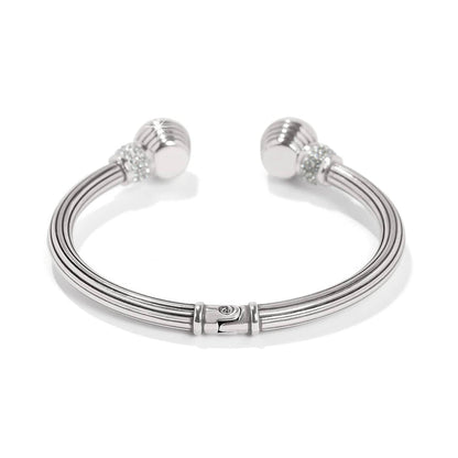 Brighton hinged cuff bracelet with silver-plated ribbed band and crystal accented ball ends on a white background