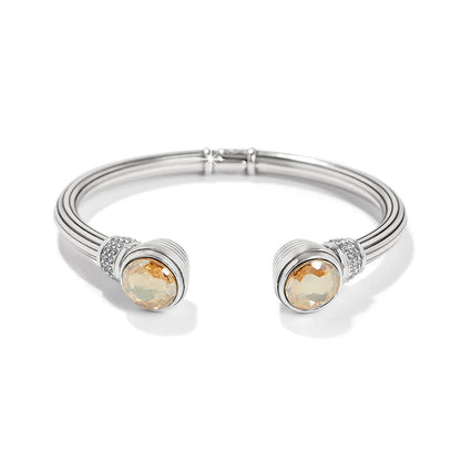 Brighton hinged cuff bracelet with silver-plated finish, champagne crystal end caps, and pavé crystal accents on a white background