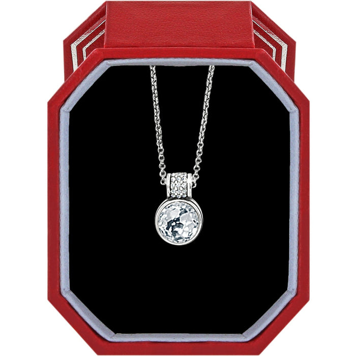 Brighton pendant necklace with round crystal and silver-plated chain displayed in a red gift box on a white background