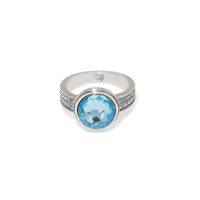 Brighton ring with large light blue faceted crystal and silver-plated band with crystal-set shoulders on a white background