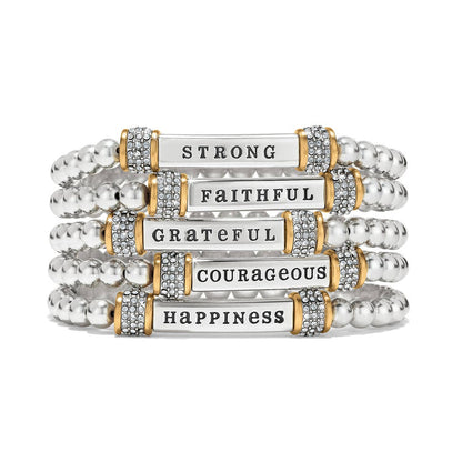 Brighton stretch bracelet set with two-tone beaded bands and crystal-accented word bars reading Strong, Faithful, Grateful, Courageous, Happiness on a white background