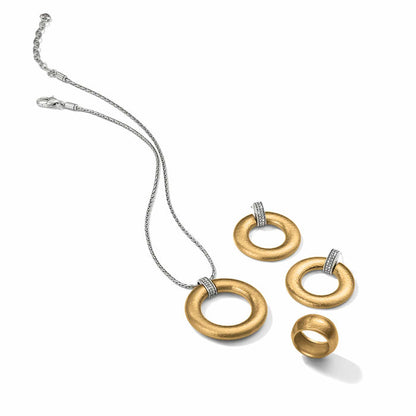 Brighton jewelry set styled with brushed gold-plated circle pendant necklace, matching earrings, and ring on white background