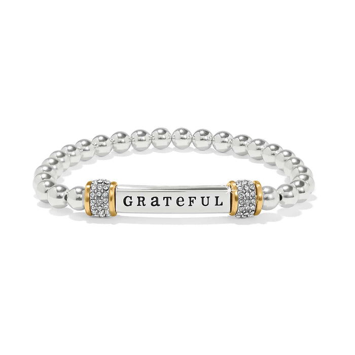 Brighton beaded stretch bracelet with Grateful bar, crystal pave accents, and two-tone finish on a white background