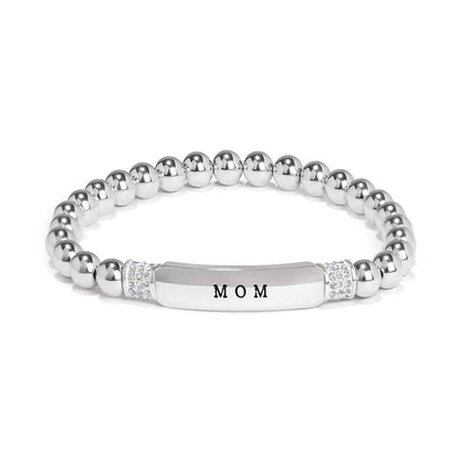 Brighton beaded stretch bracelet with silver-plated beads, engraved MOM bar, and crystal accents on a white background