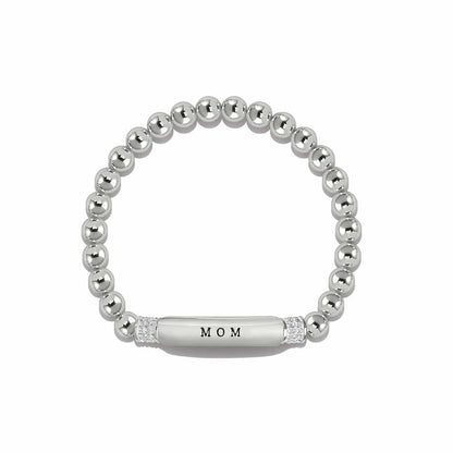 Brighton beaded stretch bracelet with silver-plated beads, Mom engraved bar, and crystal accents on a white background