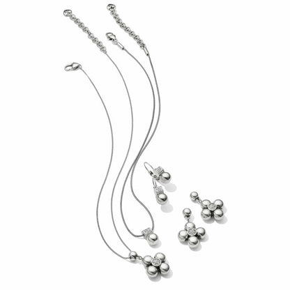 Brighton silver-plated jewelry set with floral beaded pendant necklace and matching drop earrings with crystal accents on a white background