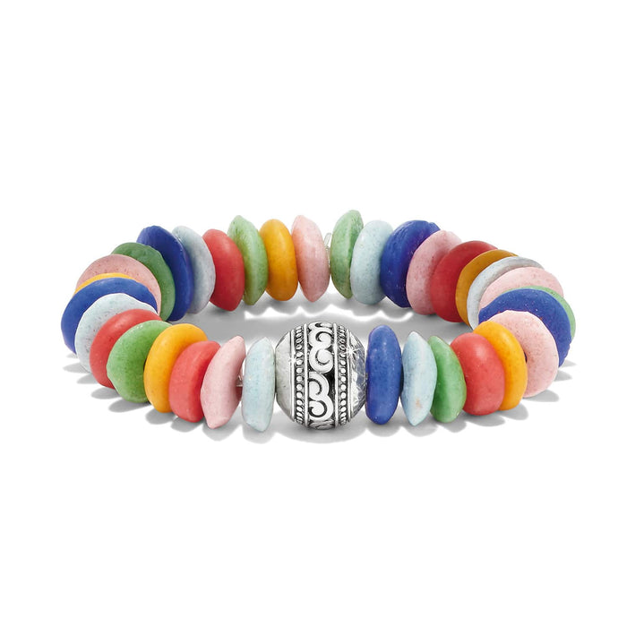 Brighton stretch bracelet with multicolored Ashanti beads and silver-plated ornate center bead on a white background
