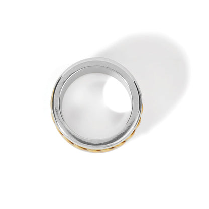 Brighton ring shown from above with two-tone silver band and gold textured edge on a white background