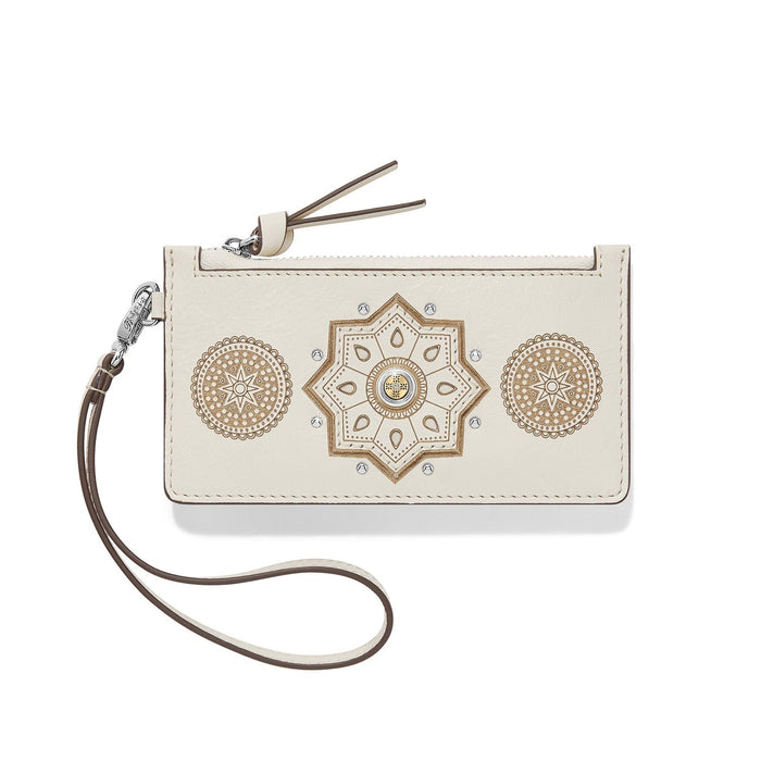 Brighton card case wristlet in cream leather with gold medallion designs, silver studs, and zip closure on a white background