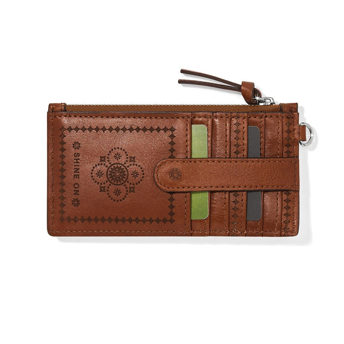 Brighton card wallet in brown leather with embossed medallion design, zip top, and snap card slot on a white background