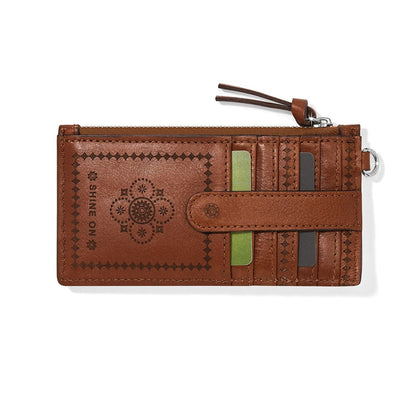 Brighton card wallet in brown leather with embossed medallion design, zip top, and snap card slot on a white background