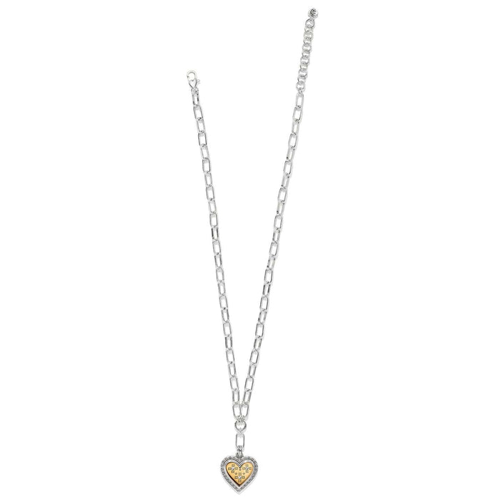 Brighton two-tone heart pendant necklace with gold center, crystal accents, and silver chain on a white background