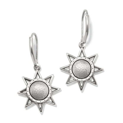 Brighton drop earrings with silver-plated eight-point star design and hammered round centers on a white background