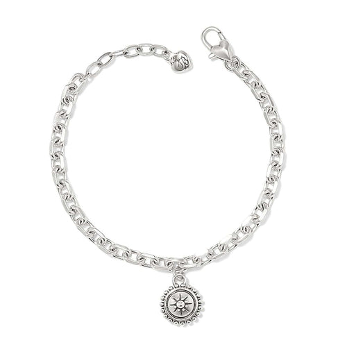 Brighton charm bracelet with silver-plated chain, lobster clasp, and round medallion charm with sunburst detail on a white background