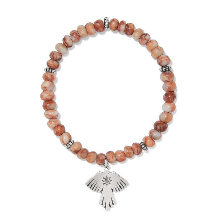 Brighton beaded stretch bracelet with orange marbled stones and silver-plated thunderbird charm on a white background