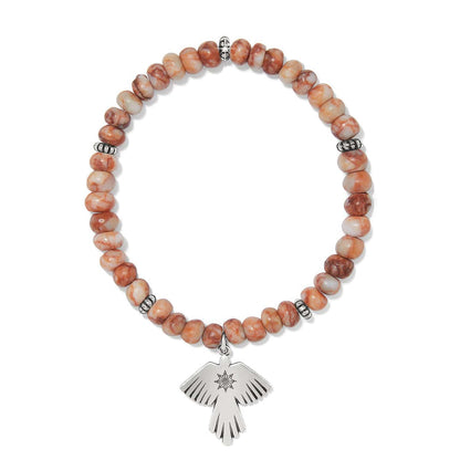 Brighton beaded stretch bracelet with orange marbled stones and silver-plated thunderbird charm on a white background