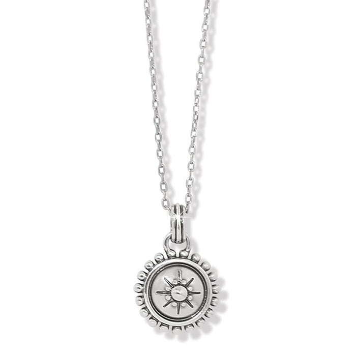 Brighton pendant necklace with silver-plated round sunburst medallion and beaded border on a white background