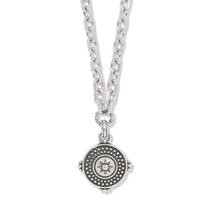 Brighton pendant necklace with silver-plated chain and round medallion featuring beaded border and star center on a white background