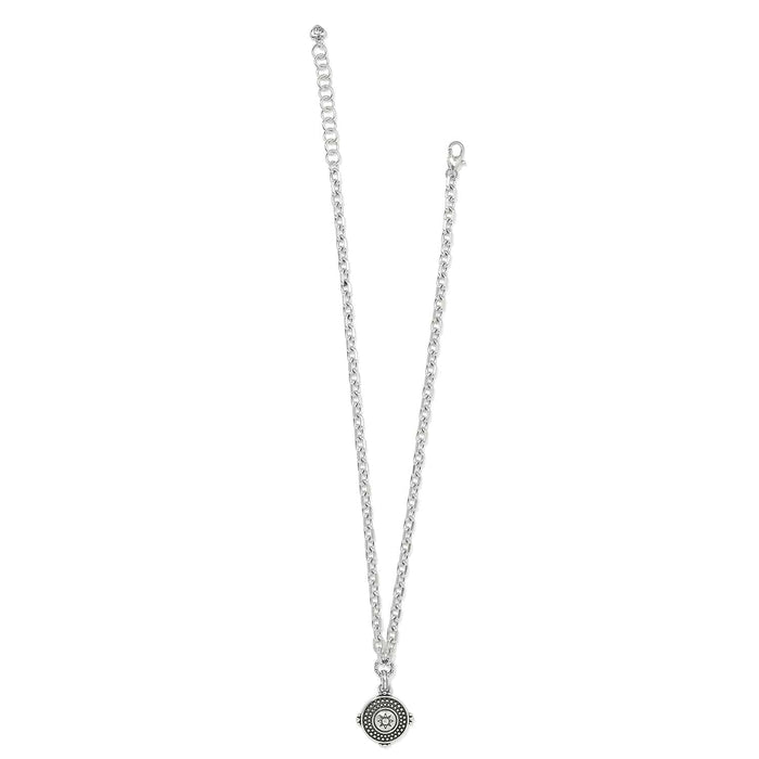 Brighton pendant necklace with silver-plated chain and round medallion featuring beaded border and star center on a white background