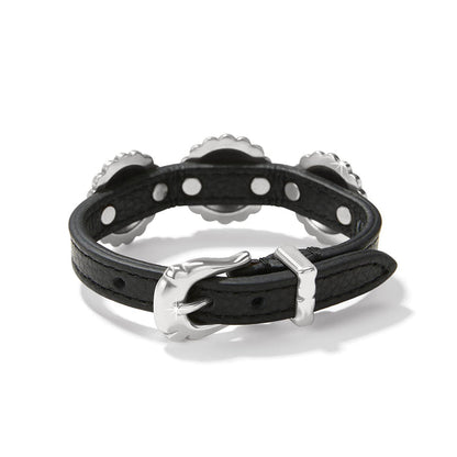 Brighton black leather bracelet shown from the back with silver-plated buckle closure and studded accents on a white background