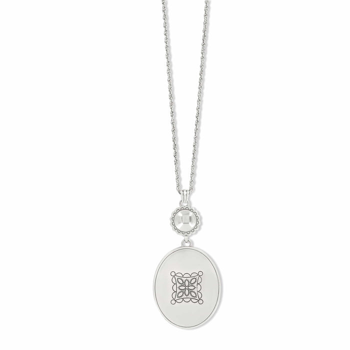 Brighton pendant necklace with silver-plated oval medallion, engraved motif, and rope chain on a white background