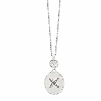 Brighton pendant necklace with silver-plated oval medallion, engraved motif, and rope chain on a white background