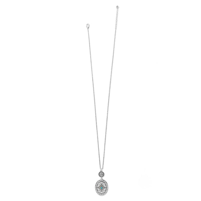 Brighton pendant necklace with silver-plated oval medallion, turquoise enamel accent, and adjustable chain on a white background