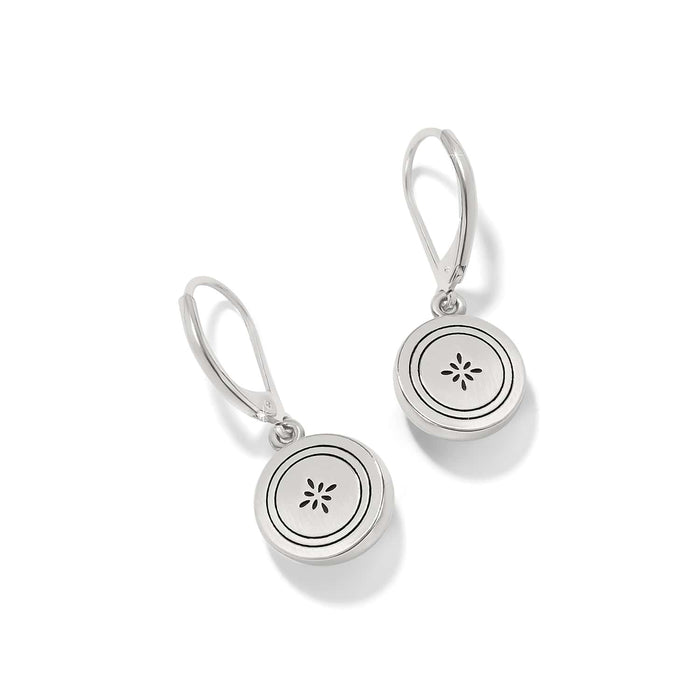 Brighton drop earrings with silver-tone round medallions featuring engraved circle and floral motif on a white background