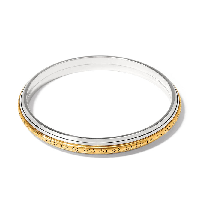 Brighton bangle bracelet with two-tone silver and gold finish featuring engraved patterned edge on a white background