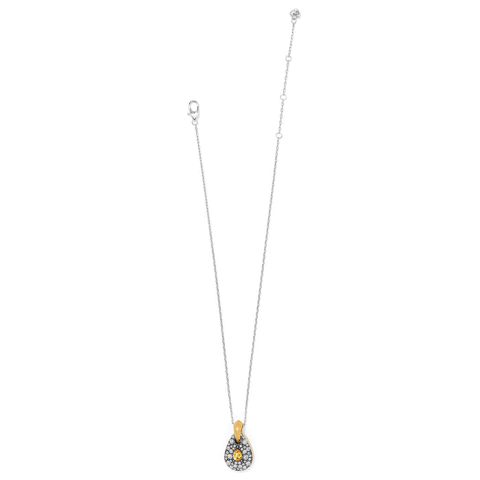 Brighton pendant necklace with two-tone teardrop, crystal pavé, and yellow crystal accent on a white background