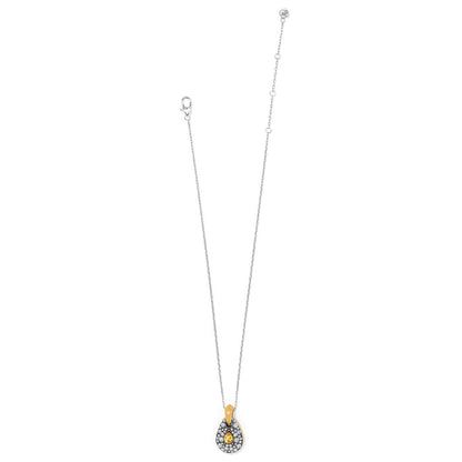 Brighton pendant necklace with two-tone teardrop, crystal pavé, and yellow crystal accent on a white background