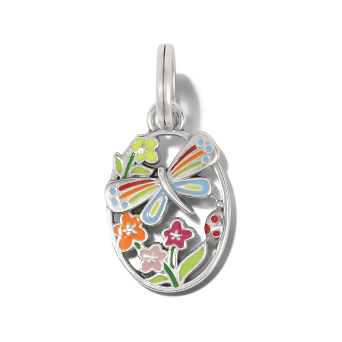 Brighton oval charm with enameled butterfly, colorful flowers, ladybug, and silver-plated frame on a white background